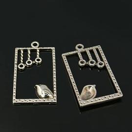 Madár fityegő, medál, antik ezüst színű, 34x19 mm