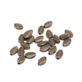 Levél köztes, gyöngy, antik bronz színű, 10x6 mm