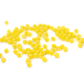 Telt sárga csiszolt bicone üveg gyöngy, 4 mm