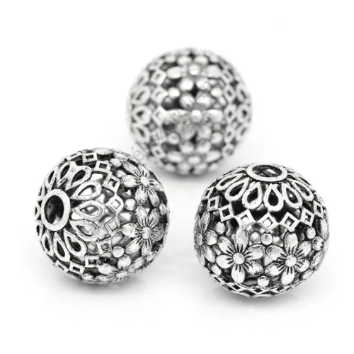 Mintás, áttört virágos köztes, antik ezüst színű, 17 mm