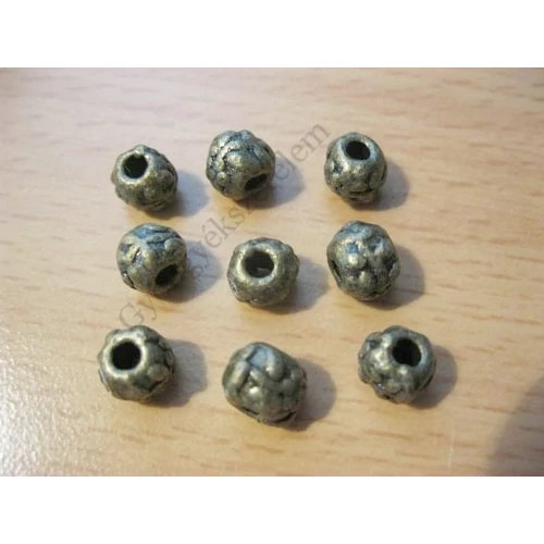 Mintás gyöngy köztes, antik bronz színű, 7x6 mm
