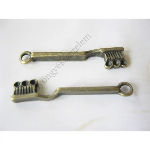 Fogkefe fityegő, medál, antik bronz színű, 25x5 mm