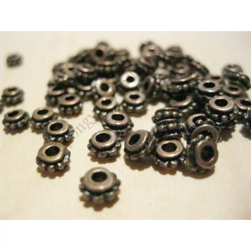 Pöttyös henger köztes, vörösréz színű, 5x2 mm
