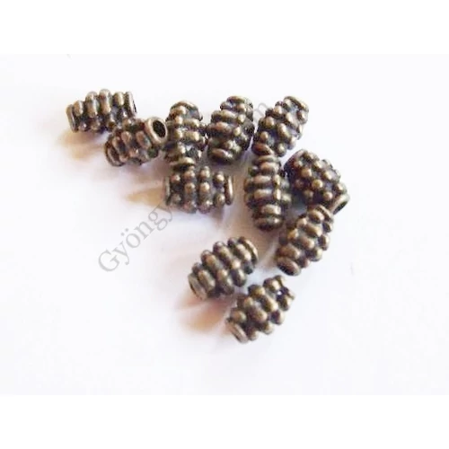 Pöttyös hordó köztes, antik bronz színű, 7x4 mm