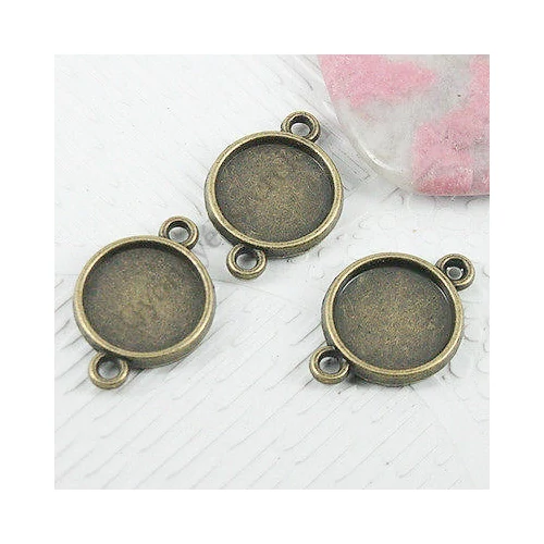 Kerek medálalap, összekötő, antik bronz színű, 21x14mm, 12 mm-es lencséhez