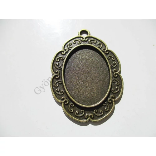 Díszes medálalap, antik bronz színű, 40x29 mm, 25x18 mm-es lencséhez