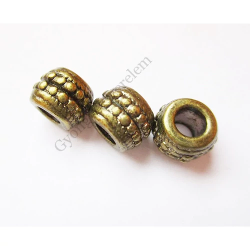 Pöttyös hordó köztes, antik bronz színű, 9x6,5 mm