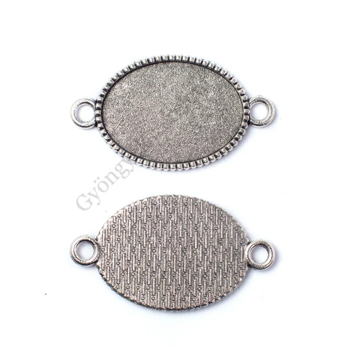 Ovális összekötő, medálalap, karkötőalap, 25x18 mm-es lencséhez, antik ezüst színű, 36x20 mm