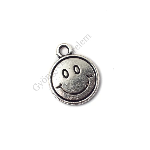 Mosolygós arc fityegő, medál, antik ezüst színű, 16x13 mm