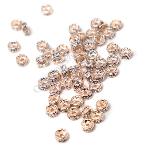 Kristály strasszköves rondell köztes gyöngy, rózsaarany színű, 4 mm
