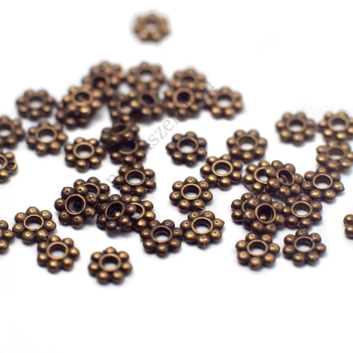 Kis virág köztes, antik bronz színű, 4 mm, 50 db/cs