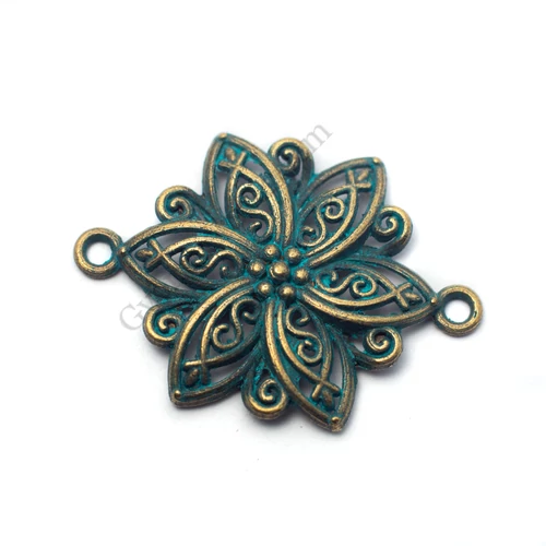Virág összekötő, patina bronz színű, 40x28 mm