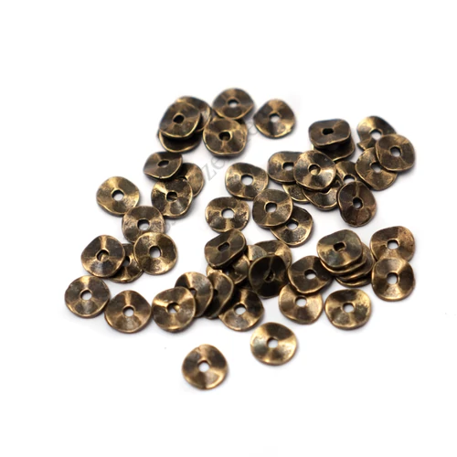 Lapos hullámos köztes, antik bronz színű, 6 mm