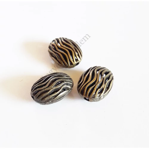 Hullámos ovális köztes, antik bronz színű, 17x12x8 mm