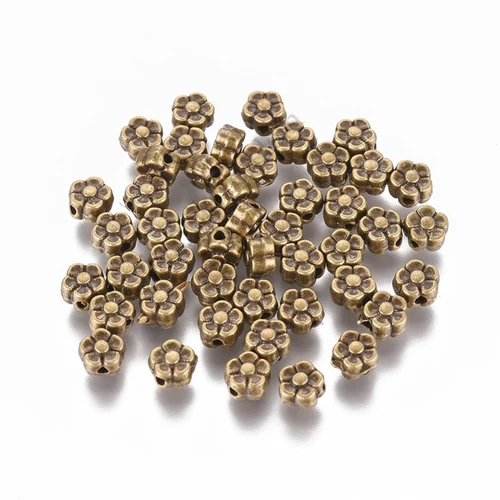 Virág köztes, antik bronz színű, 5x3 mm, 20 db/cs