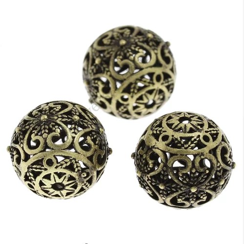 Mintás áttört gömb köztes, antik bronz színű, 17 mm