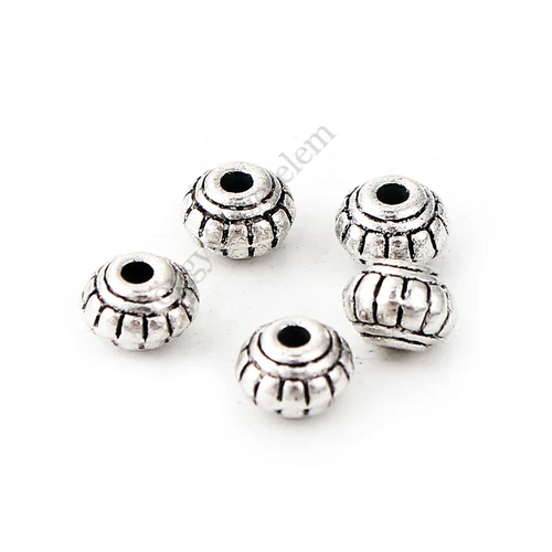 Csíkos köztes gyöngy, antik ezüst színű, 6x4 mm