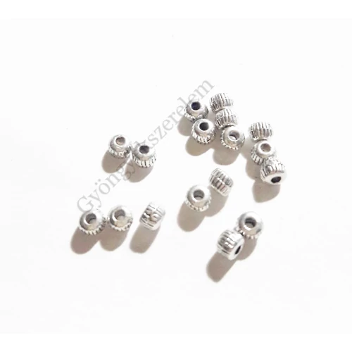 Csíkos kicsi golyó köztes, antik ezüst színű, 3x2 mm