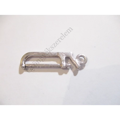 Fűrész, szerszám fityegő, medál, antik ezüst színű, 25x8 mm