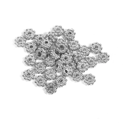 Kis virág köztes, antik ezüst színű, 6 mm, 50 db/cs