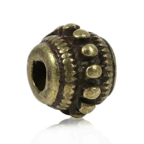 Pöttyös köztes, antik bronz színű, 8x6 mm