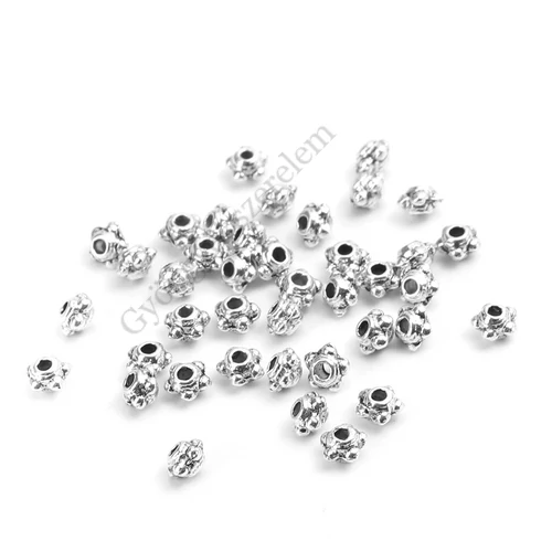 Pici pöttyös köztes, antik ezüst színű, 4 mm, 50 db/cs