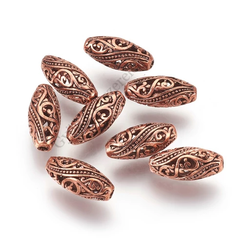 Áttört mintás köztes, vörösréz színű, 17x8 mm