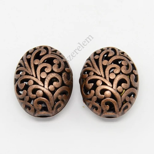 Áttört ovális köztes, vörösréz színű, 22x17x13 mm