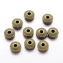 Kép 2/2 - Korong köztes, antik bronz színű, 8x4 mm
