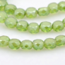 Kép 1/2 - Zöld lüszteres, kerek, lapos, csiszolt üveg gyöngy, 4x3 mm