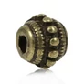 Kép 1/2 - Pöttyös köztes, antik bronz színű, 8x6 mm