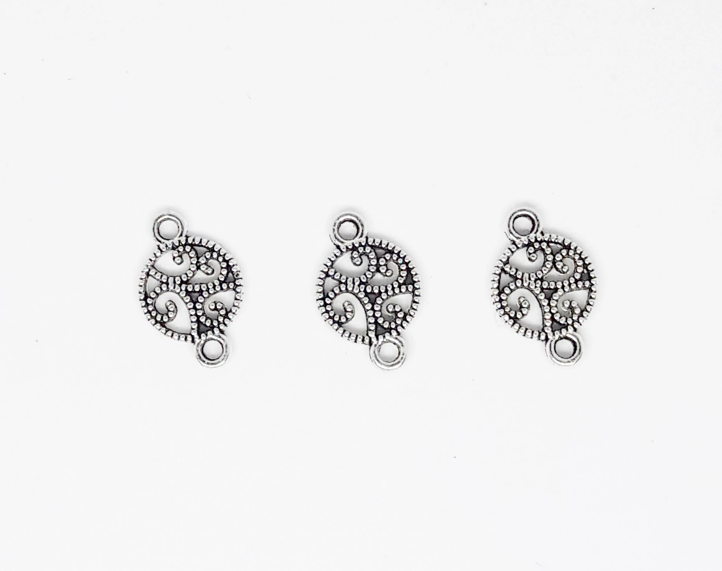 Kerek összekötő, antik ezüst színű, 16x10 mm