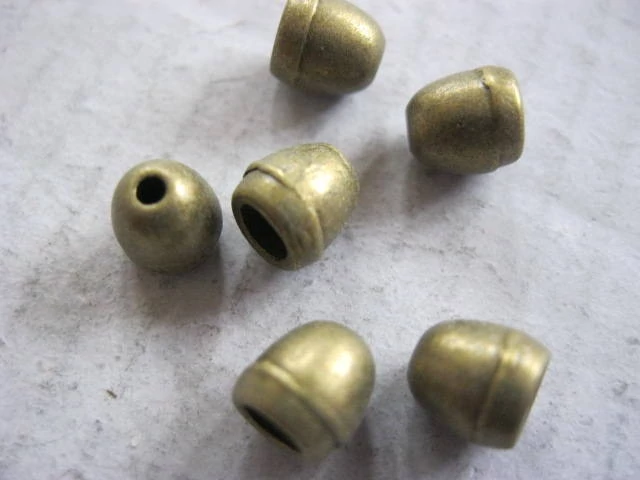 Kúpos gyöngykupak, antik bronz színű, 7x6 mm