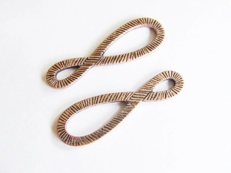 Nyolcas, végtelen összekötő, medál, vörösréz színű, 44x14 mm