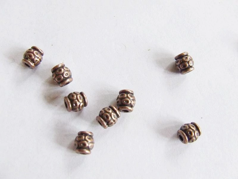 Pöttyös hordó köztes, vörösréz színű, 6x5 mm