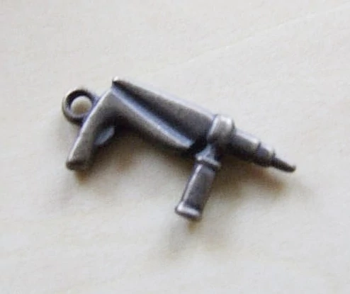 Fúró, szerszám fityegő, medál, antik bronz színű, 26x13 mm