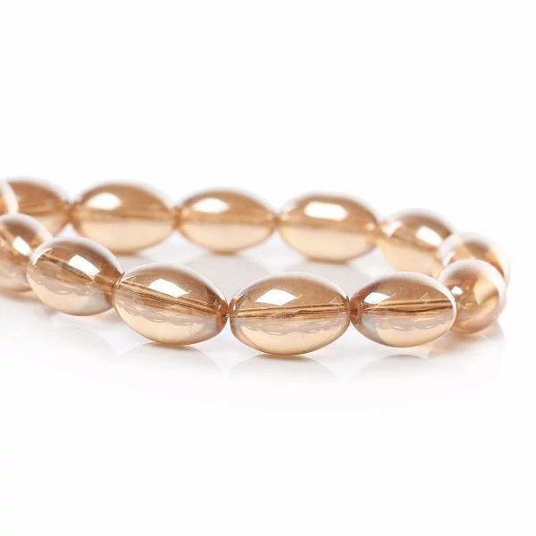 Arany pezsgősárga ovális üveg gyöngy, 15x10 mm