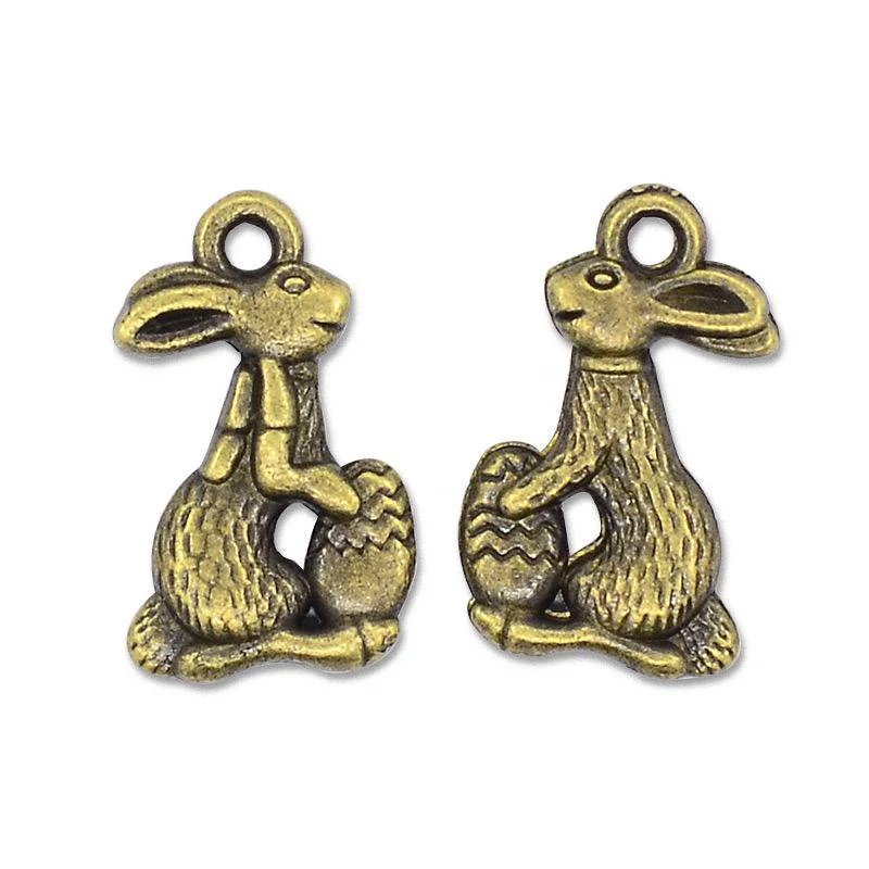 Húsvéti nyuszi és tojás fityegő, medál, antik bronz színű, 18x11 mm