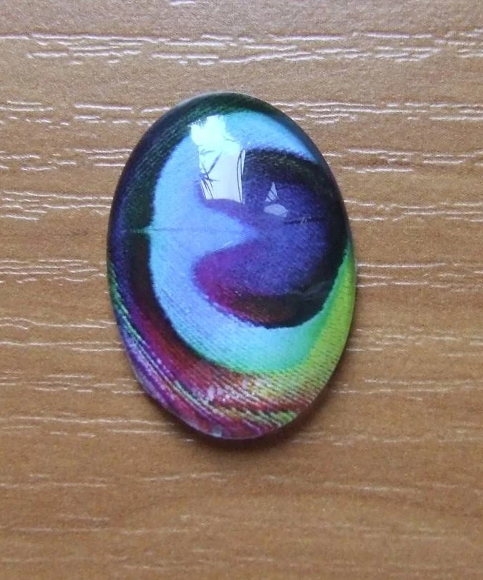 Páva toll mintás üveglencse, kaboson, 25x18 mm