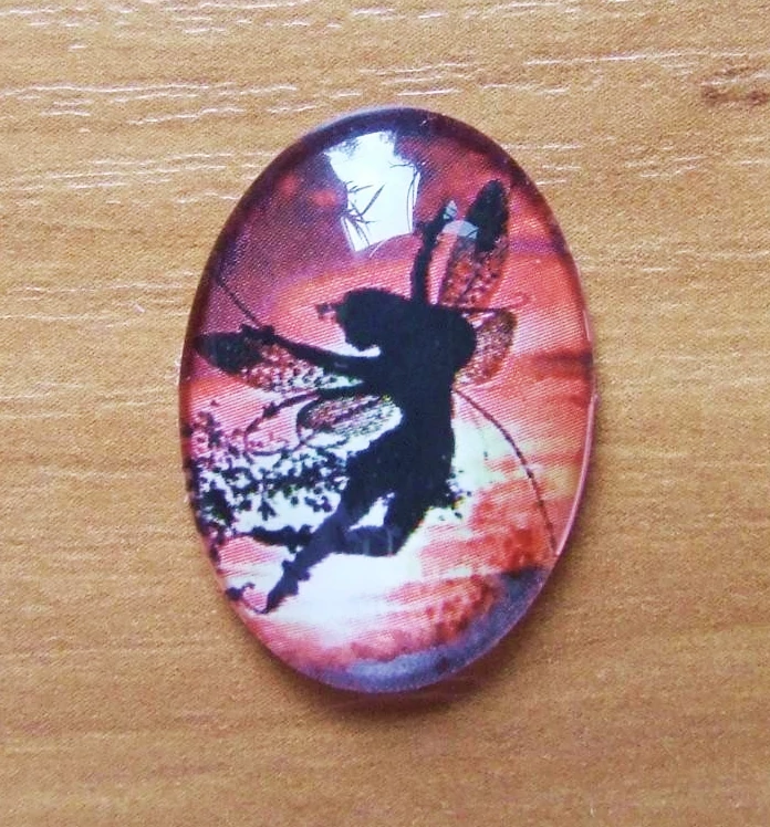 Tündér mintás üveglencse, kaboson, 25x18 mm