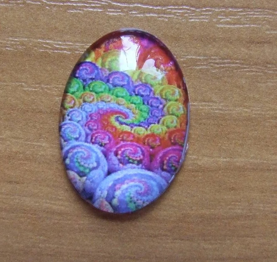 Színes spirál mintás üveglencse, kaboson, 25x18 mm