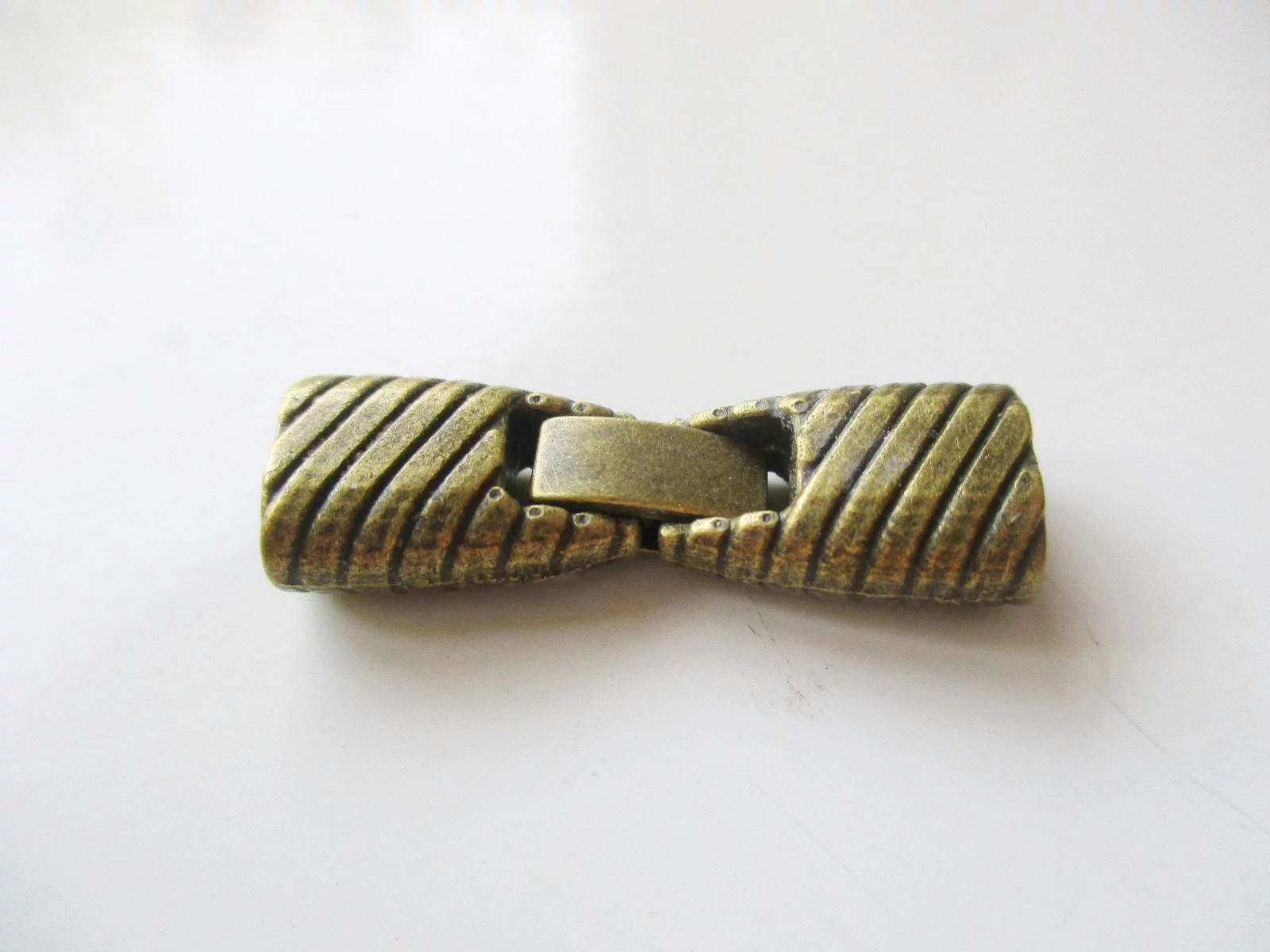 Kapocs, bőrhöz, antik bronz színű, 32x10 mm