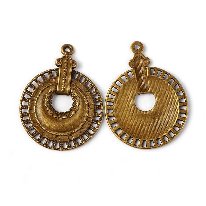 Díszes kerek fityegő, medál, antik bronz színű, 40x30 mm