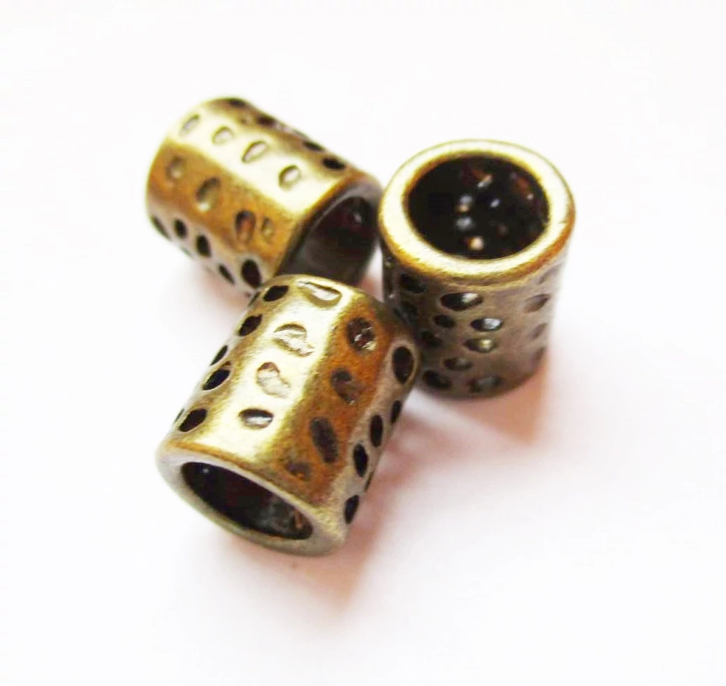 Lyukas henger köztes, antik bronz színű, 9x8 mm