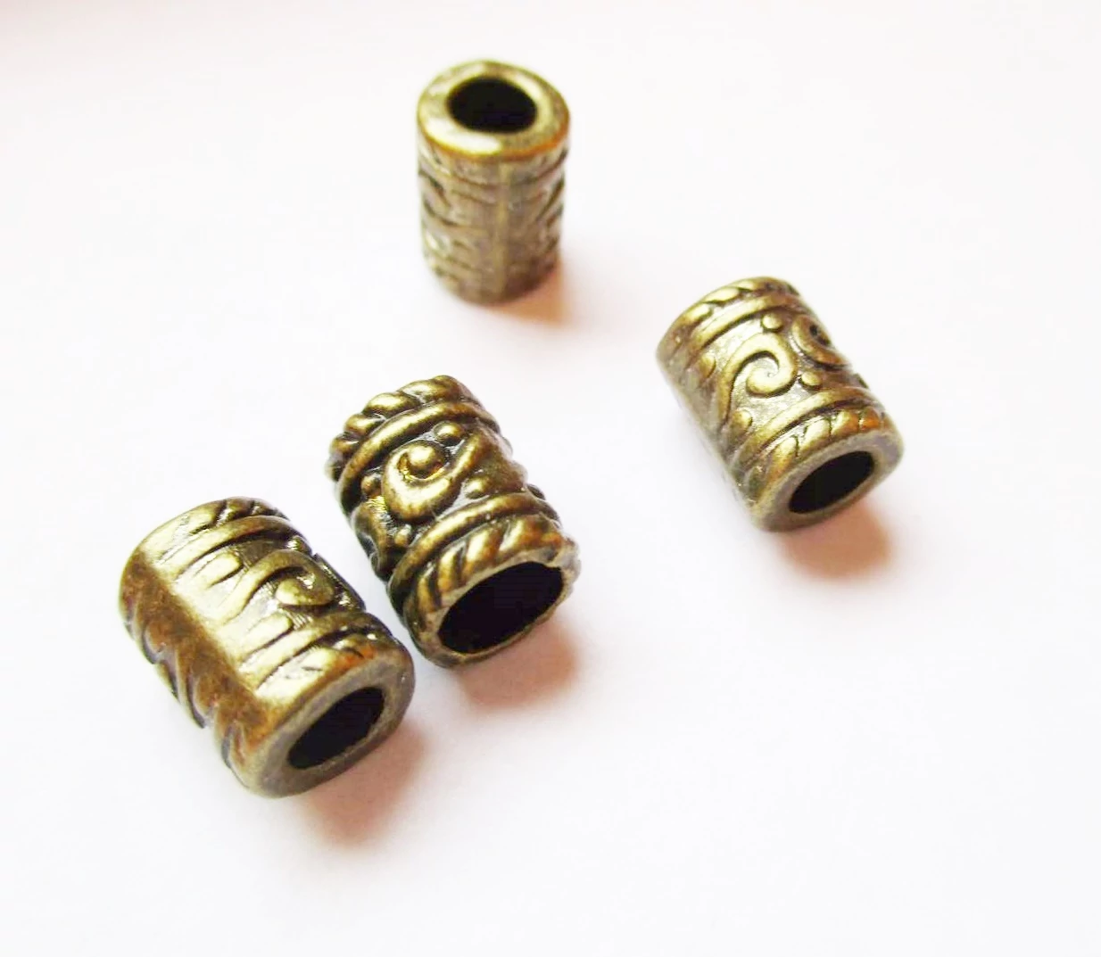 Díszes henger köztes, antik bronz színű, 9x6 mm