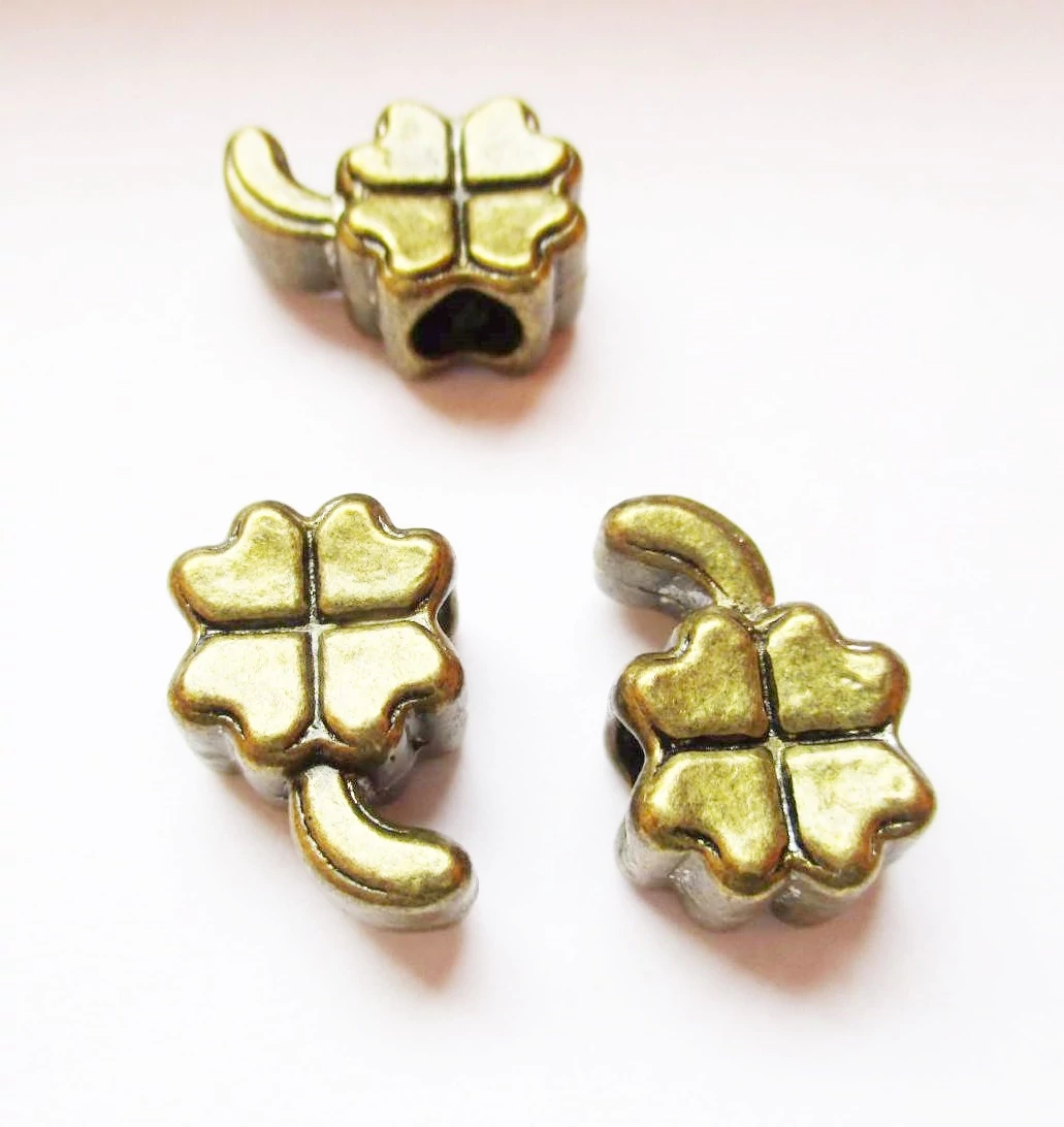 Lóhere, szerencse köztes, antik bronz színű, 16x11x7 mm
