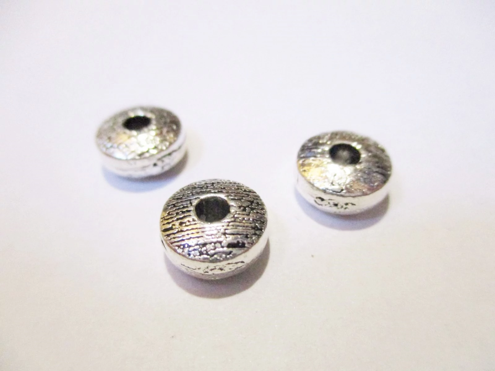 Korong köztes, antik ezüst színű, 8x4 mm