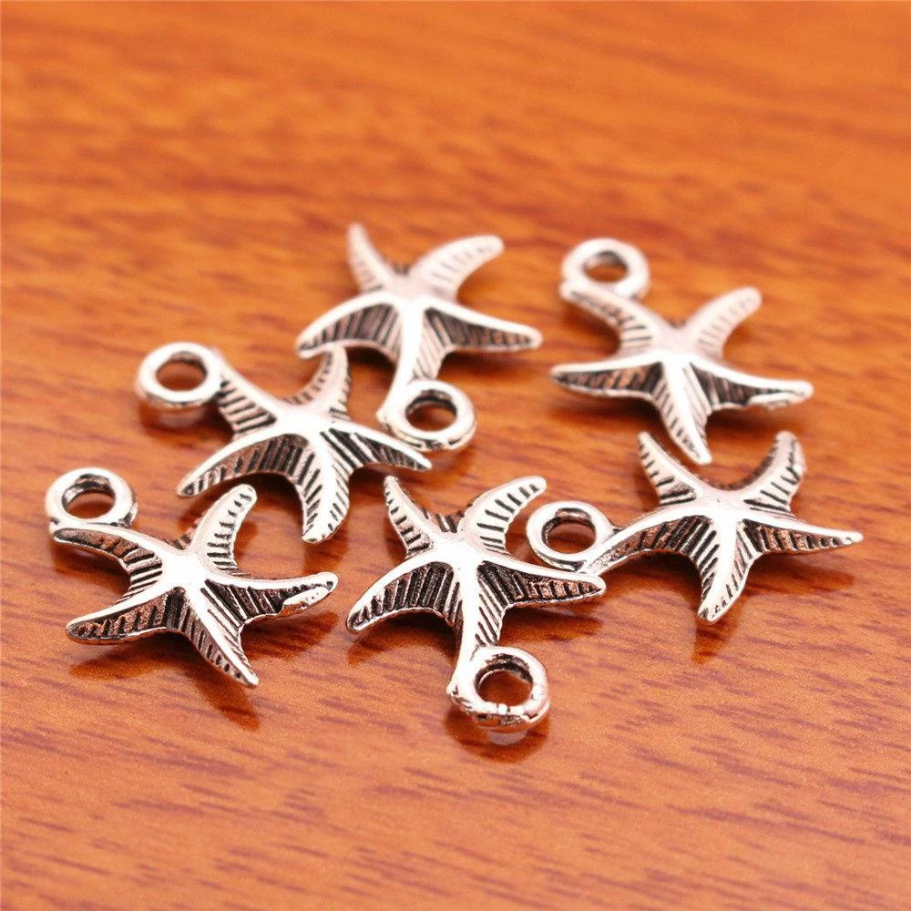Tengeri csillag fityegő, medál, antik ezüst színű, 17x13 mm
