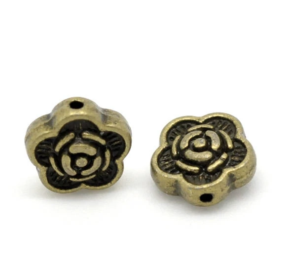 Virág köztes, antik bronz színű, 7x3 mm