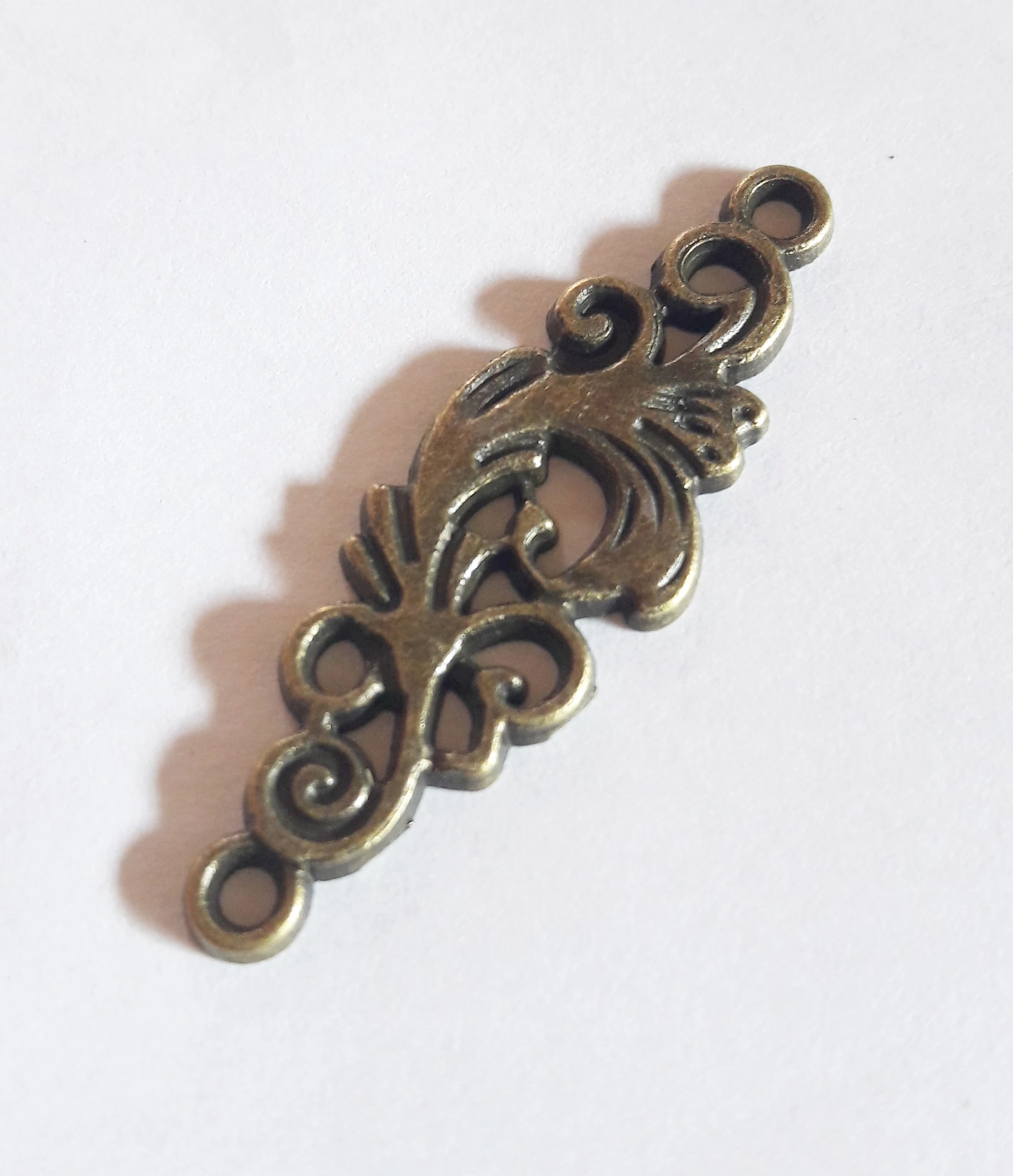 Díszes összekötő, medálalap, fülbevalóalap, antik bronz színű, 36x11 mm